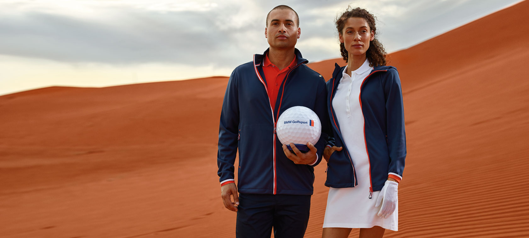 Man en vrouw in de BMW Golfsport Collection. Man en vrouw in de BMW Golfsport Collection.